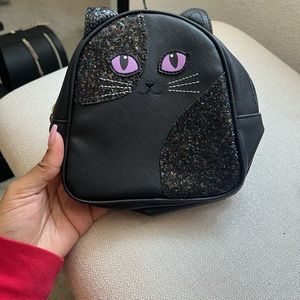 Black small kitty back pack with purple and blue sparkles!!